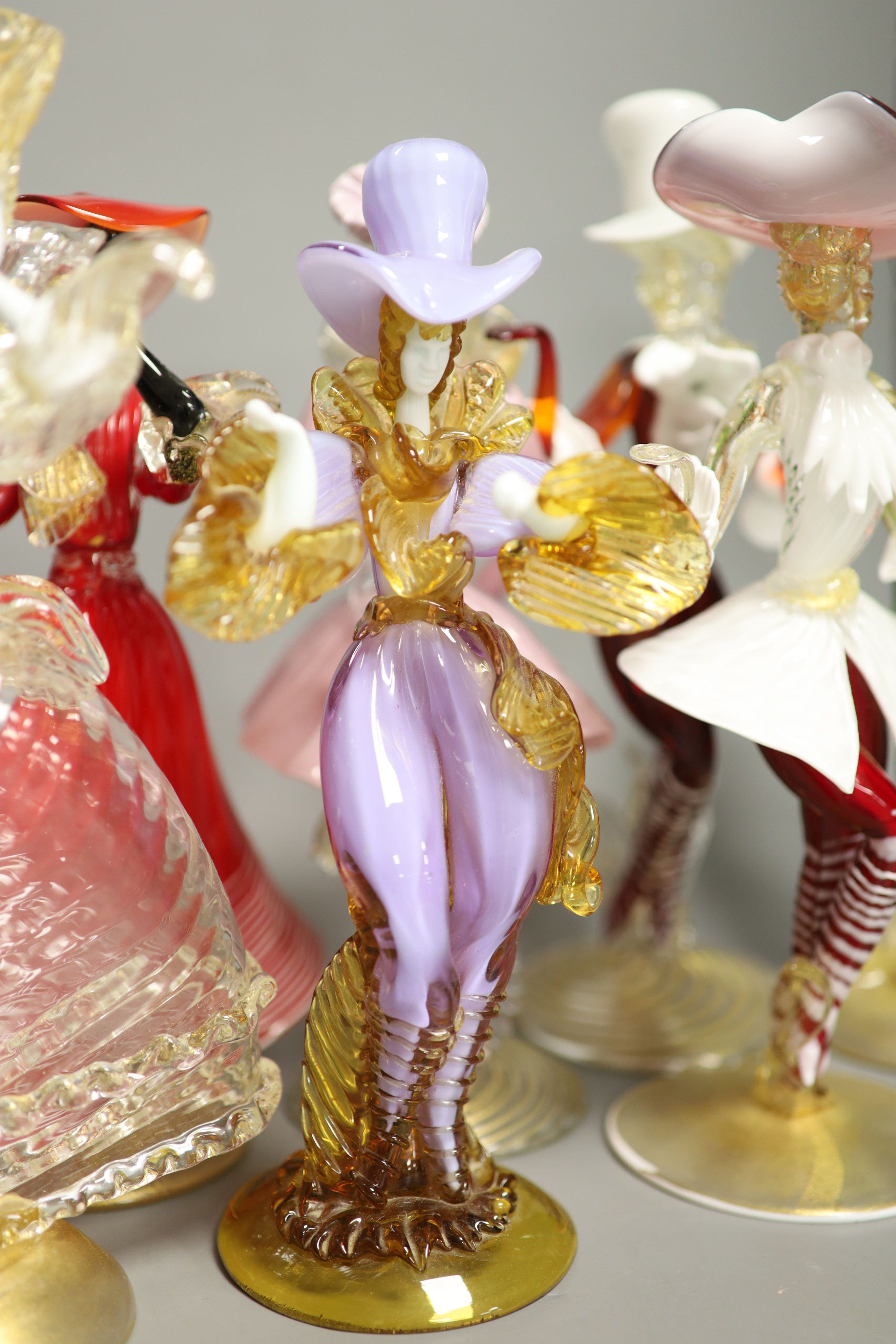 A group of eight Murano glass figures of dancers, tallest 32cm